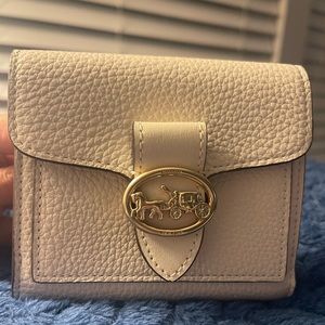 Coach mini coin purse . Beautiful white pebbled leather. New